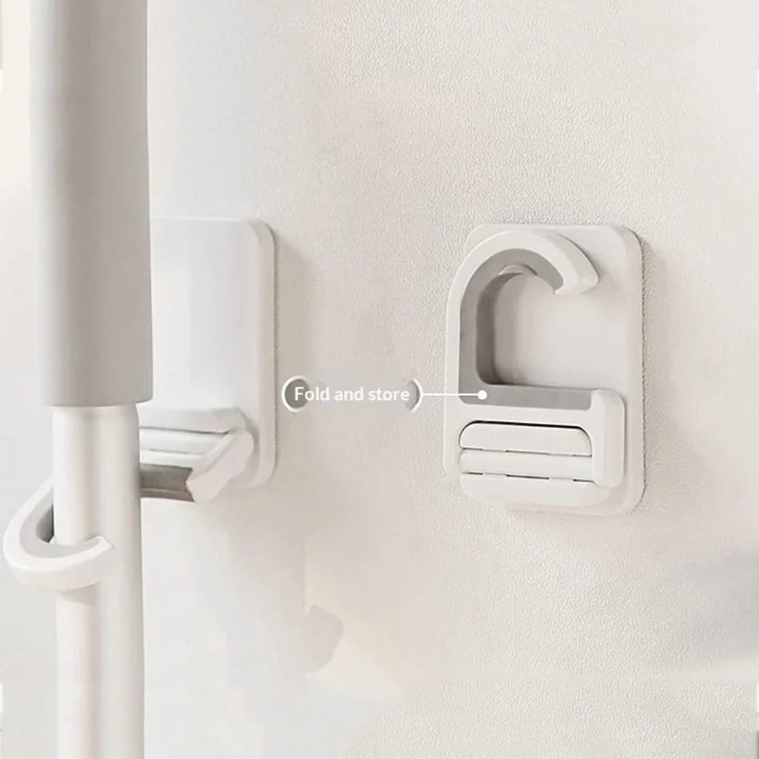 تعليقة عصاية تلزيق متعددة الاستخدام – بدون حفر — Self-Adhesive Multi-Purpose Mop Holder – No Drilling