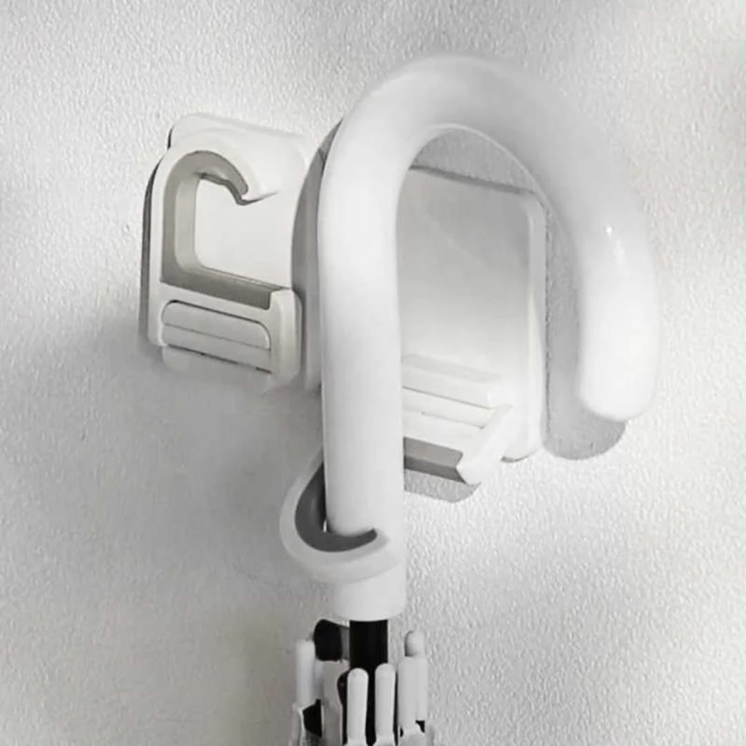 تعليقة عصاية تلزيق متعددة الاستخدام – بدون حفر — Self-Adhesive Multi-Purpose Mop Holder – No Drilling