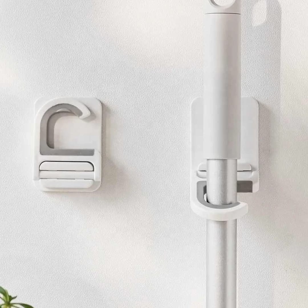 تعليقة عصاية تلزيق متعددة الاستخدام – بدون حفر — Self-Adhesive Multi-Purpose Mop Holder – No Drilling